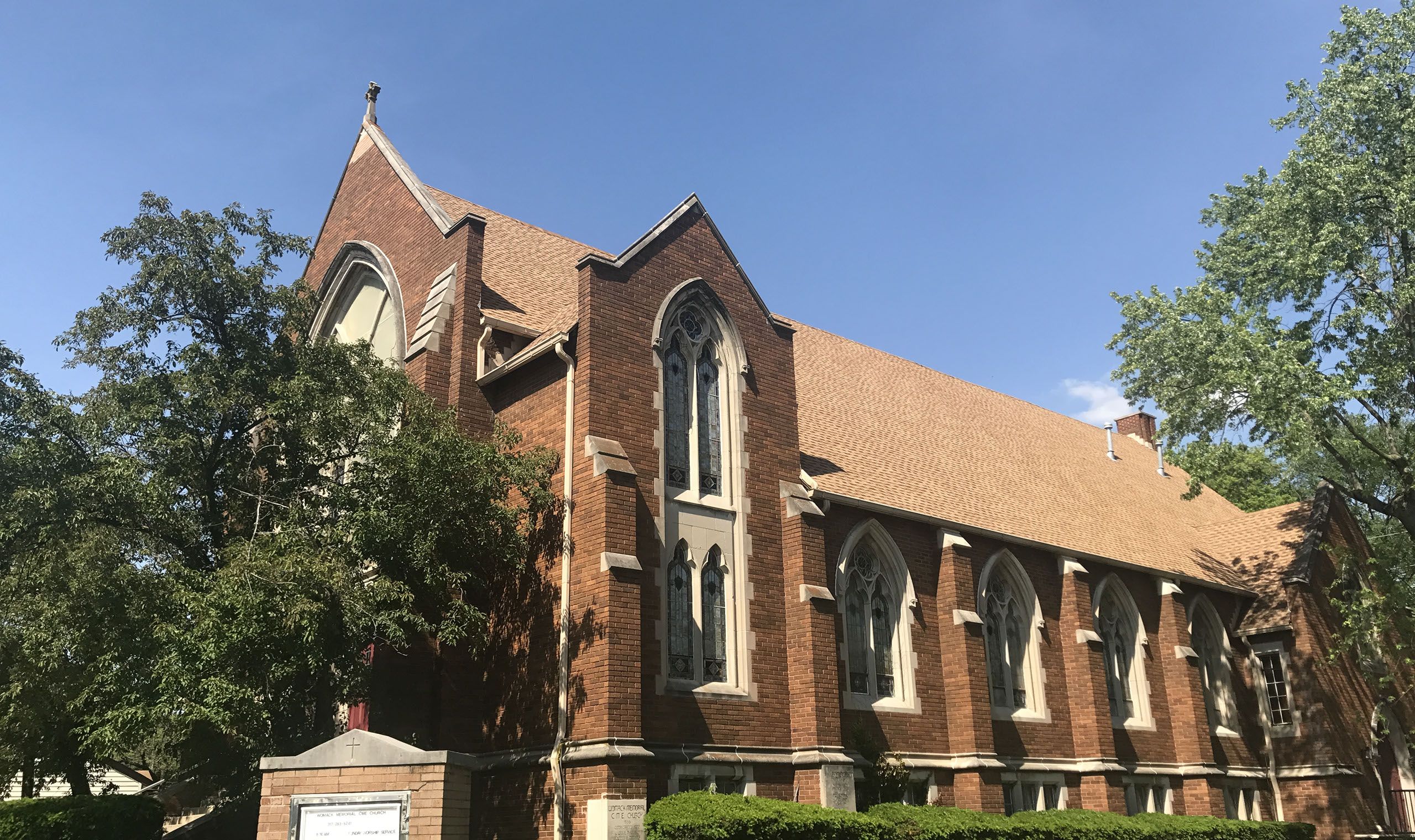 The red-brick Gothic Revival sanctuary of Womack Memorial CME Church on Carrollton Avenue